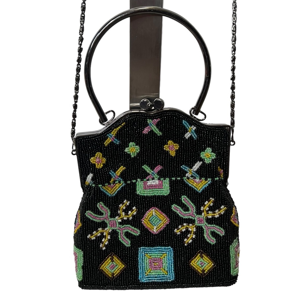 Handmade vintage glass beaded handbag with a black frame and chain strap